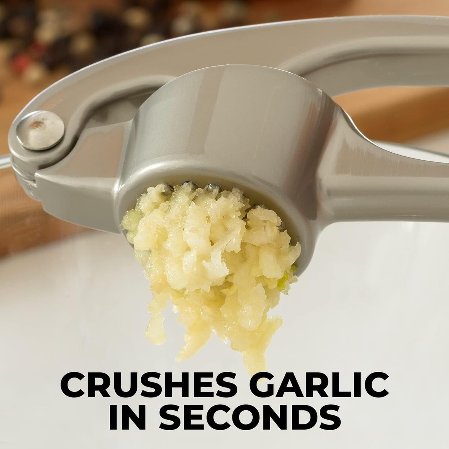 Premium Garlic Press with Soft Easy-Squeeze Ergonomic Handle, Sturdy Design Extracts More Garlic Paste per Clove, Garlic Crusher for Nuts & Seeds, Professional Garlic Mincer & Ginger Press - by Zulay